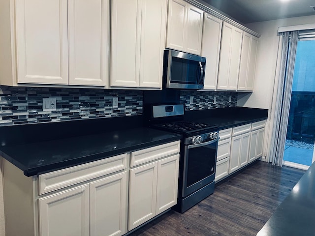 2560 Greg Jarvis Ave, Sacramento, CA 95834 - kitchen with stainless steel appliances, dark countertops, dark wood finished floors, backsplash, and white cabinetry