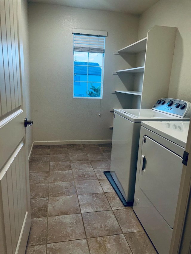 2560 Greg Jarvis Ave, Sacramento, CA 95834 - clothes washing area featuring washer and dryer and baseboards