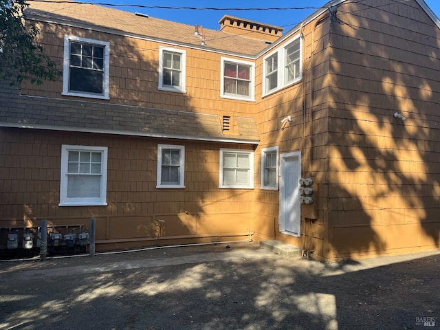 470 Wilson Ave, Vallejo, CA 94590 - rear view of house with a shingled roof