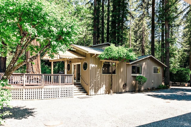 2859 Wallace Creek Rd, Healdsburg, CA 95448 - rustic home with board and batten siding and a deck
