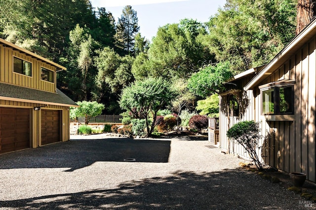 2859 Wallace Creek Rd, Healdsburg, CA 95448 - view of yard with asphalt driveway and a garage