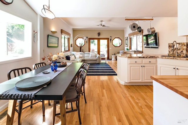 2859 Wallace Creek Rd, Healdsburg, CA 95448 - dining room featuring light wood-style flooring and a ceiling fan