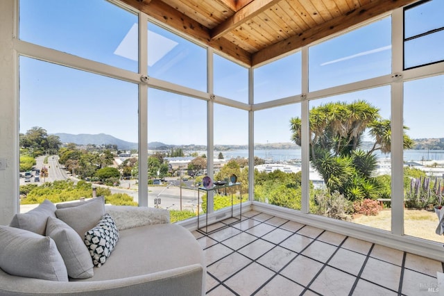503 Easterby St, Sausalito, CA 94965 - sunroom featuring wood ceiling, a water and mountain view, tile patterned flooring, and healthy amount of natural light