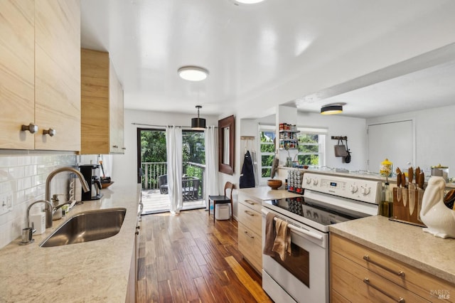503 Easterby St, Sausalito, CA 94965 - kitchen with white electric range, a sink, tasteful backsplash, and plenty of natural light