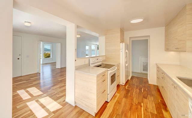503 Easterby St, Sausalito, CA 94965 - kitchen with white appliances, light wood finished floors, light countertops, and modern cabinets