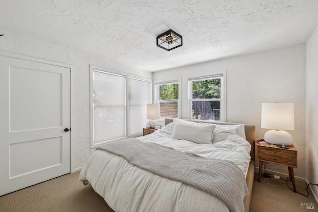 503 Easterby St, Sausalito, CA 94965 - carpeted bedroom featuring a textured ceiling, baseboards, and a textured wall