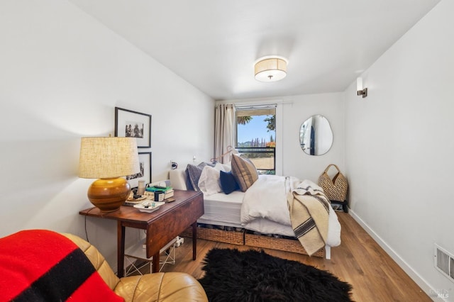 503 Easterby St, Sausalito, CA 94965 - bedroom featuring wood finished floors, baseboards, and access to outside