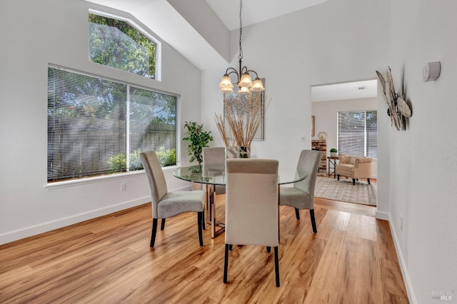 63 Brighton Dr, Vallejo, CA 94591 - dining space with healthy amount of natural light, light wood-style floors, baseboards, and high vaulted ceiling