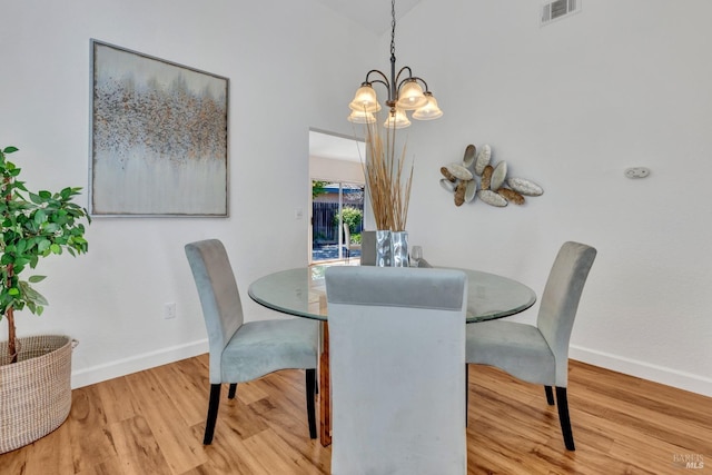 63 Brighton Dr, Vallejo, CA 94591 - dining space featuring baseboards, wood finished floors, and a chandelier