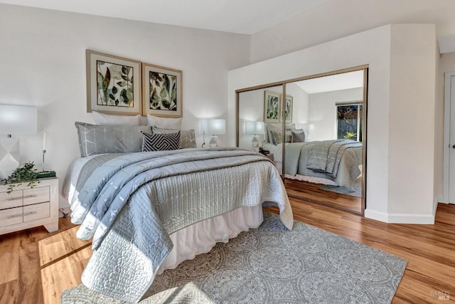 63 Brighton Dr, Vallejo, CA 94591 - bedroom with a closet, wood finished floors, baseboards, and lofted ceiling