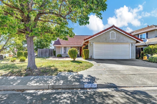 63 Brighton Dr, Vallejo, CA 94591 - view of front of home with an attached garage, driveway, stucco siding, and a tile roof
