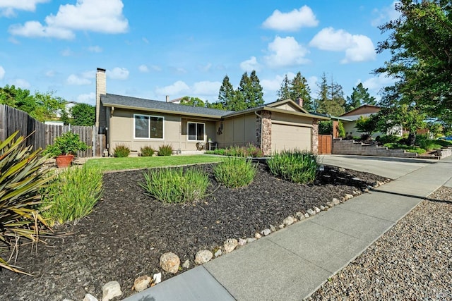 1006 Birkdale Dr, Napa, CA 94559 - ranch-style house featuring fence, concrete driveway, an attached garage, a chimney, and stucco siding
