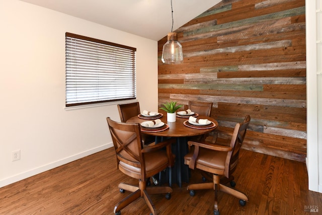 1006 Birkdale Dr, Napa, CA 94559 - dining space with vaulted ceiling, wood walls, baseboards, and wood finished floors