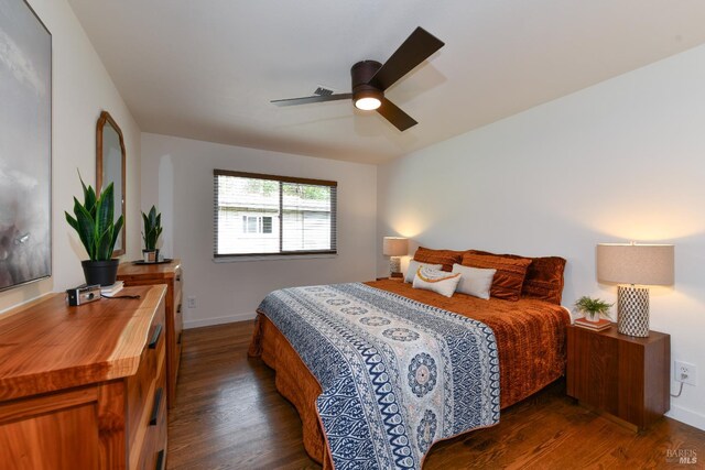 1006 Birkdale Dr, Napa, CA 94559 - bedroom with dark wood-style flooring, baseboards, and ceiling fan