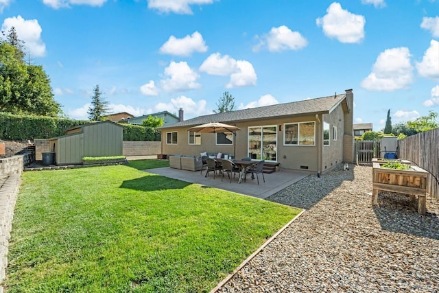 1006 Birkdale Dr, Napa, CA 94559 - back of house with a storage unit, a patio, an outdoor structure, stucco siding, and outdoor lounge area