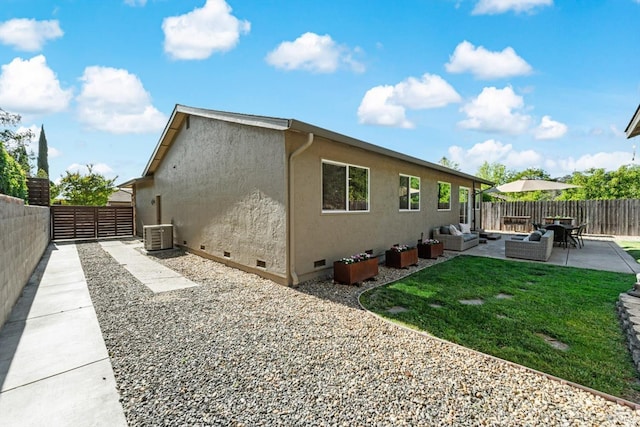 1006 Birkdale Dr, Napa, CA 94559 - rear view of property featuring crawl space, an outdoor living space, stucco siding, a patio area, and central AC unit