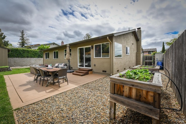 1006 Birkdale Dr, Napa, CA 94559 - rear view of house featuring a vegetable garden, entry steps, crawl space, a patio area, and a fenced backyard