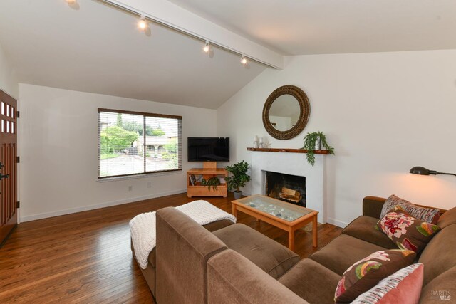 1006 Birkdale Dr, Napa, CA 94559 - living room with track lighting, a fireplace, wood finished floors, and baseboards