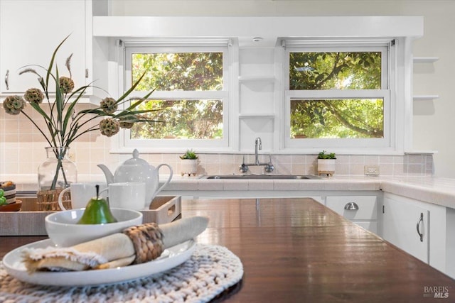2787 N Fitch Mountain Rd, Healdsburg, CA 95448 - kitchen with a sink, white cabinetry, tasteful backsplash, and tile countertops