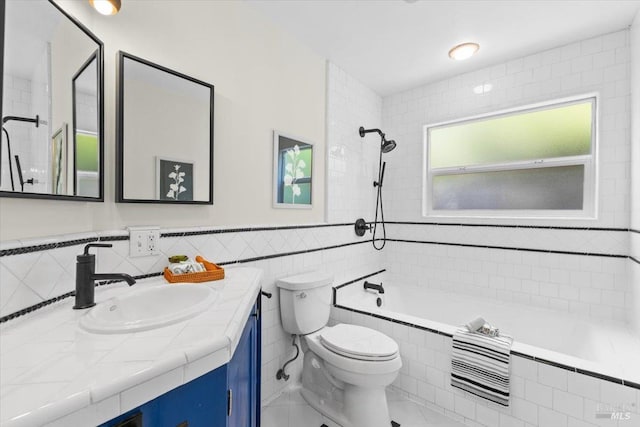 2787 N Fitch Mountain Rd, Healdsburg, CA 95448 - full bathroom with tile walls, toilet, vanity, and tiled shower / bath