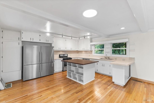 2787 N Fitch Mountain Rd, Healdsburg, CA 95448 - kitchen featuring stainless steel appliances, open shelves, a sink, white cabinets, and recessed lighting