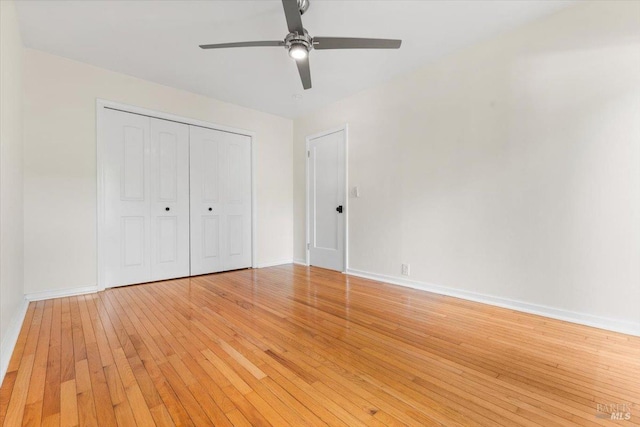 2787 N Fitch Mountain Rd, Healdsburg, CA 95448 - unfurnished bedroom with light wood finished floors, baseboards, a closet, and a ceiling fan