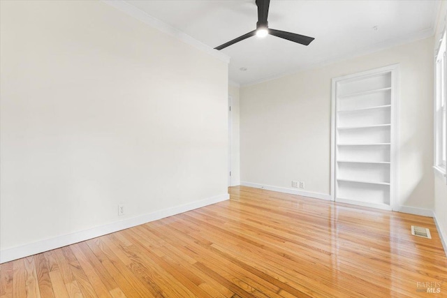 2787 N Fitch Mountain Rd, Healdsburg, CA 95448 - unfurnished bedroom featuring ornamental molding, light wood-style flooring, baseboards, ceiling fan, and a closet