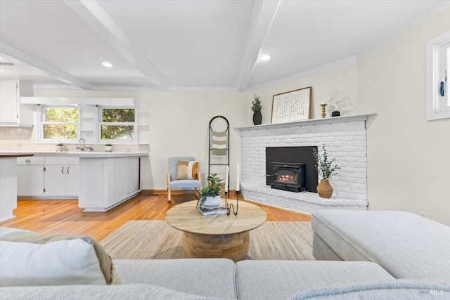 2787 N Fitch Mountain Rd, Healdsburg, CA 95448 - living room with beam ceiling, light wood-style floors, recessed lighting, and a brick fireplace