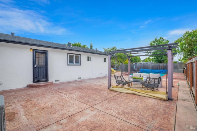 view of patio featuring an outdoor hangout area, a fenced backyard, and a pergola