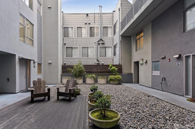 view of property's community with a patio area