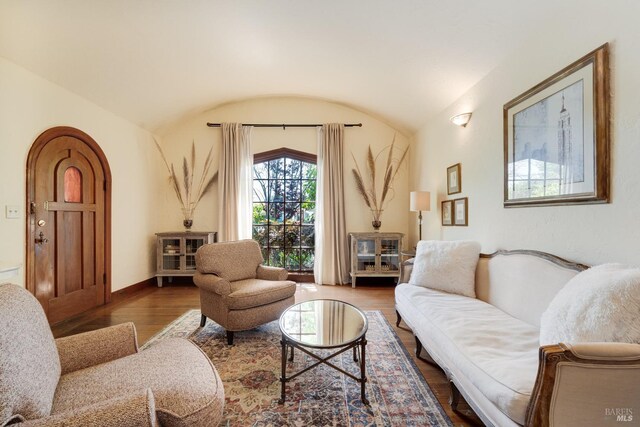 2110 3rd St, Napa, CA 94559 - living room with lofted ceiling, wood finished floors, arched walkways, and baseboards
