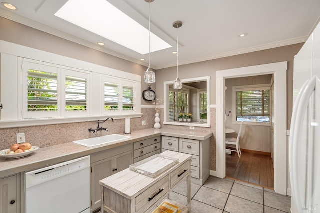 2110 3rd St, Napa, CA 94559 - kitchen featuring white appliances, a sink, tasteful backsplash, ornamental molding, and light countertops