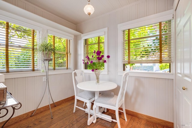 2110 3rd St, Napa, CA 94559 - dining room featuring plenty of natural light, wood finished floors, ornamental molding, wood walls, and baseboards