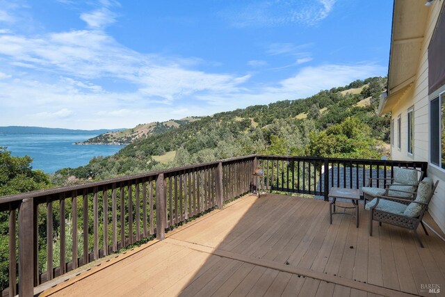 9260 Leila Dr, Glenhaven, CA 95443 - wooden deck featuring a water view