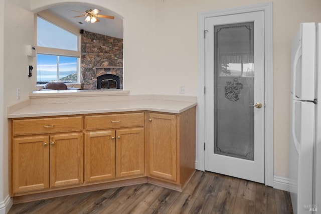 9260 Leila Dr, Glenhaven, CA 95443 - kitchen featuring freestanding refrigerator, a ceiling fan, dark wood-type flooring, and light countertops