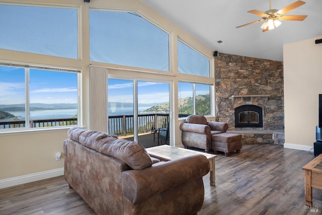 9260 Leila Dr, Glenhaven, CA 95443 - living room featuring a water view, baseboards, a ceiling fan, and high vaulted ceiling