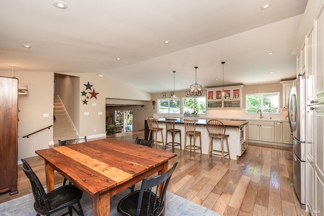 3355 Covey Ct, Napa, CA 94558 - dining room featuring light wood finished floors, lofted ceiling, stairway, and recessed lighting