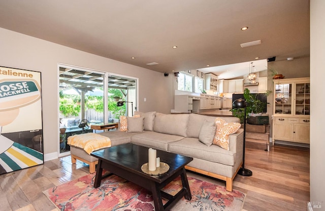 3355 Covey Ct, Napa, CA 94558 - living room with light wood-style floors, recessed lighting, and vaulted ceiling