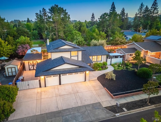 3355 Covey Ct, Napa, CA 94558 - view of front facade with fence, an attached garage, concrete driveway, stucco siding, and a gate