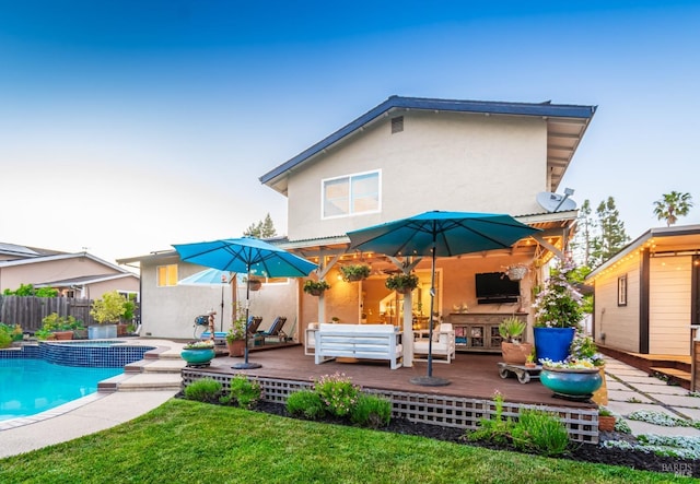 3355 Covey Ct, Napa, CA 94558 - rear view of house featuring stucco siding, a wooden deck, an outdoor hangout area, and a pool with connected hot tub