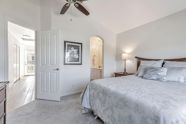 2064 Easton Dr, Petaluma, CA 94952 - carpeted bedroom with arched walkways, ensuite bathroom, baseboards, lofted ceiling, and a ceiling fan