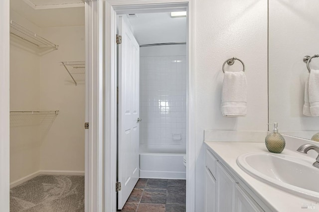 2064 Easton Dr, Petaluma, CA 94952 - bathroom featuring vanity, washtub / shower combination, a walk in closet, and toilet