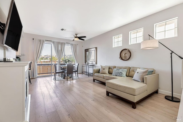 2064 Easton Dr, Petaluma, CA 94952 - living area with ceiling fan, light wood-type flooring, and baseboards