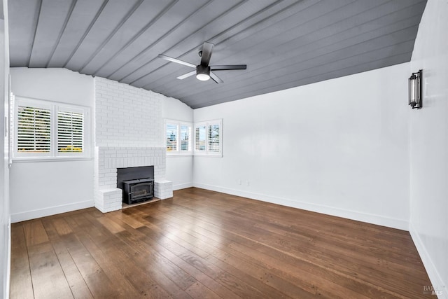 1444 Ohio St, Vallejo, CA 94590 - unfurnished living room featuring vaulted ceiling, ceiling fan, a wood stove, wood-type flooring, and baseboards