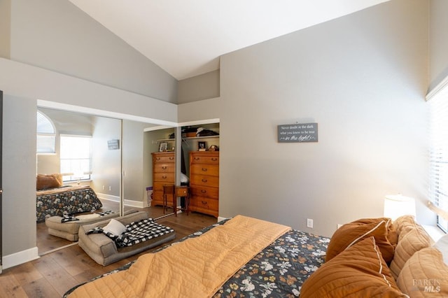 829 Winton Dr, Petaluma, CA 94954 - bedroom featuring hardwood / wood-style floors, vaulted ceiling, a closet, and baseboards