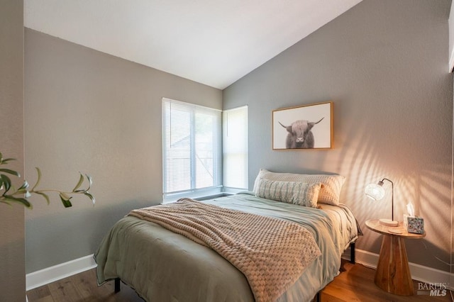 829 Winton Dr, Petaluma, CA 94954 - bedroom featuring vaulted ceiling, wood finished floors, and baseboards