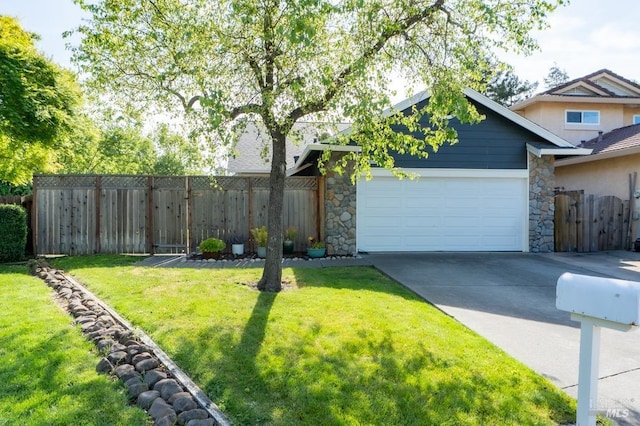 829 Winton Dr, Petaluma, CA 94954 - view of front of property featuring stone siding, an attached garage, and driveway