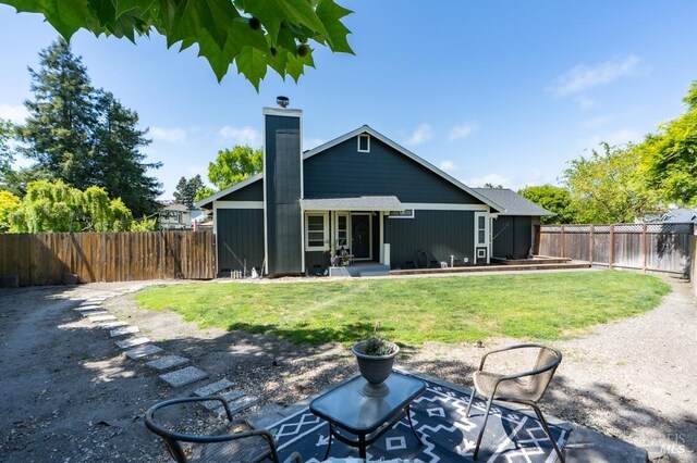 829 Winton Dr, Petaluma, CA 94954 - rear view of house featuring a chimney and a patio area