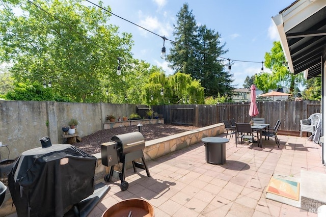 829 Winton Dr, Petaluma, CA 94954 - fenced backyard featuring area for grilling, a patio area, and outdoor dining space