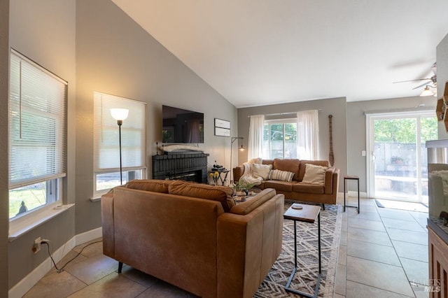 829 Winton Dr, Petaluma, CA 94954 - living area featuring light tile patterned floors, a ceiling fan, baseboards, high vaulted ceiling, and a fireplace